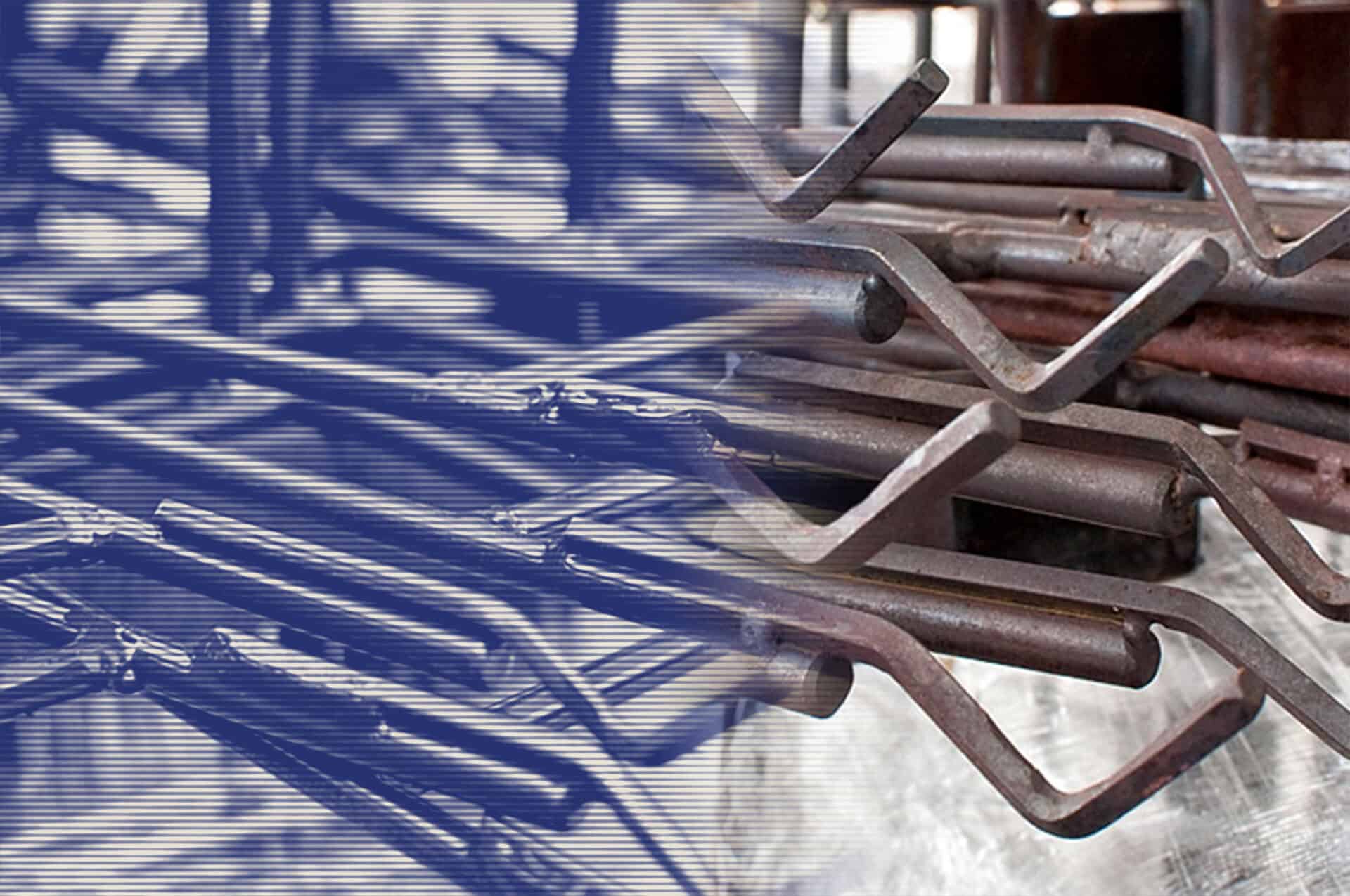 Metal rods in a Carolina Chem Strip facility showcasing high capacity solutions to help manufacturers maintain smooth, efficient production.
